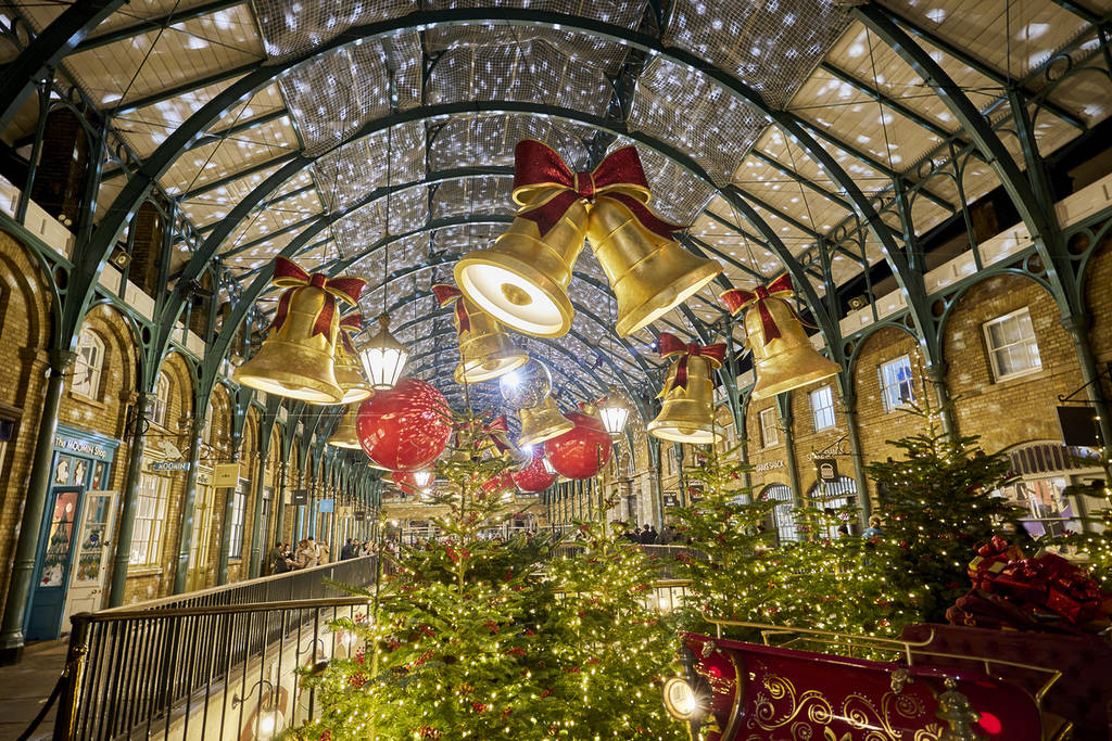 the oversized bells and baubles hanging in covent garden