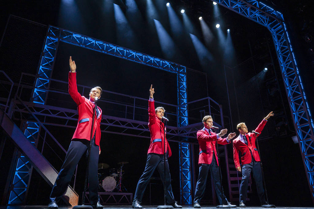 four performers onstage during a performance of London theatre show Jersey Boys