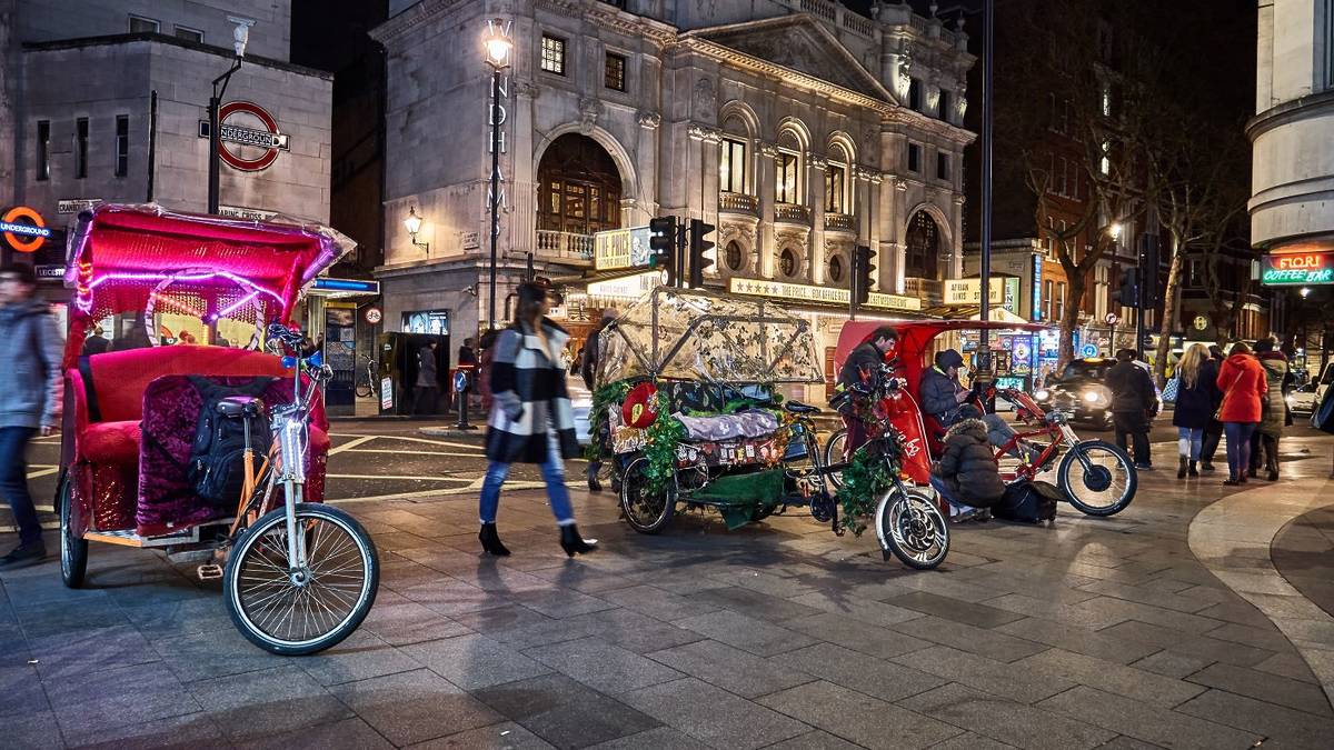 Pedicabs at Leicester Square at night