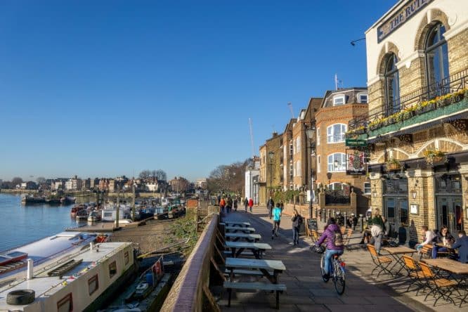 The beer garden by the thames of the Rutland Arms, one of the best riverside pubs in London