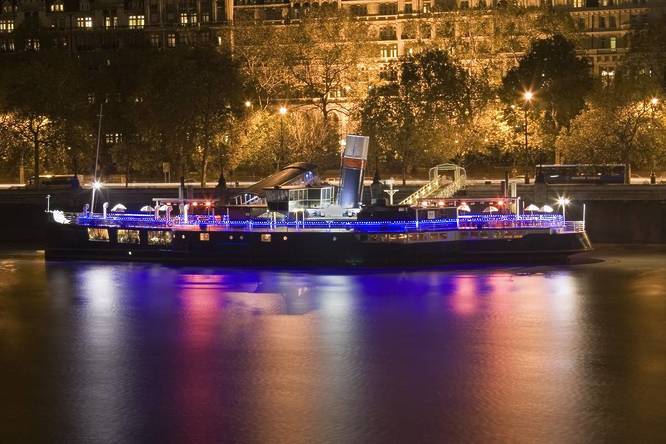 A party boat docked on the Thames
